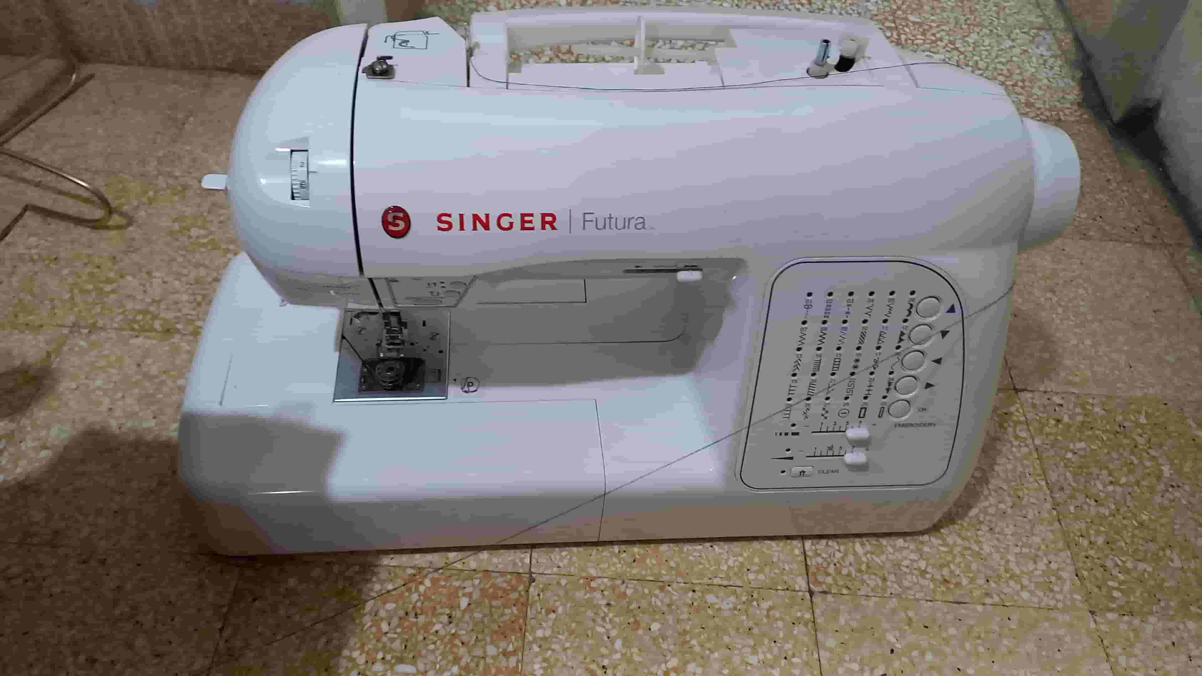 مكنة خياطة وتطريز وحبكه