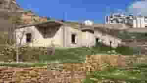 ارض مع بيت للبيع